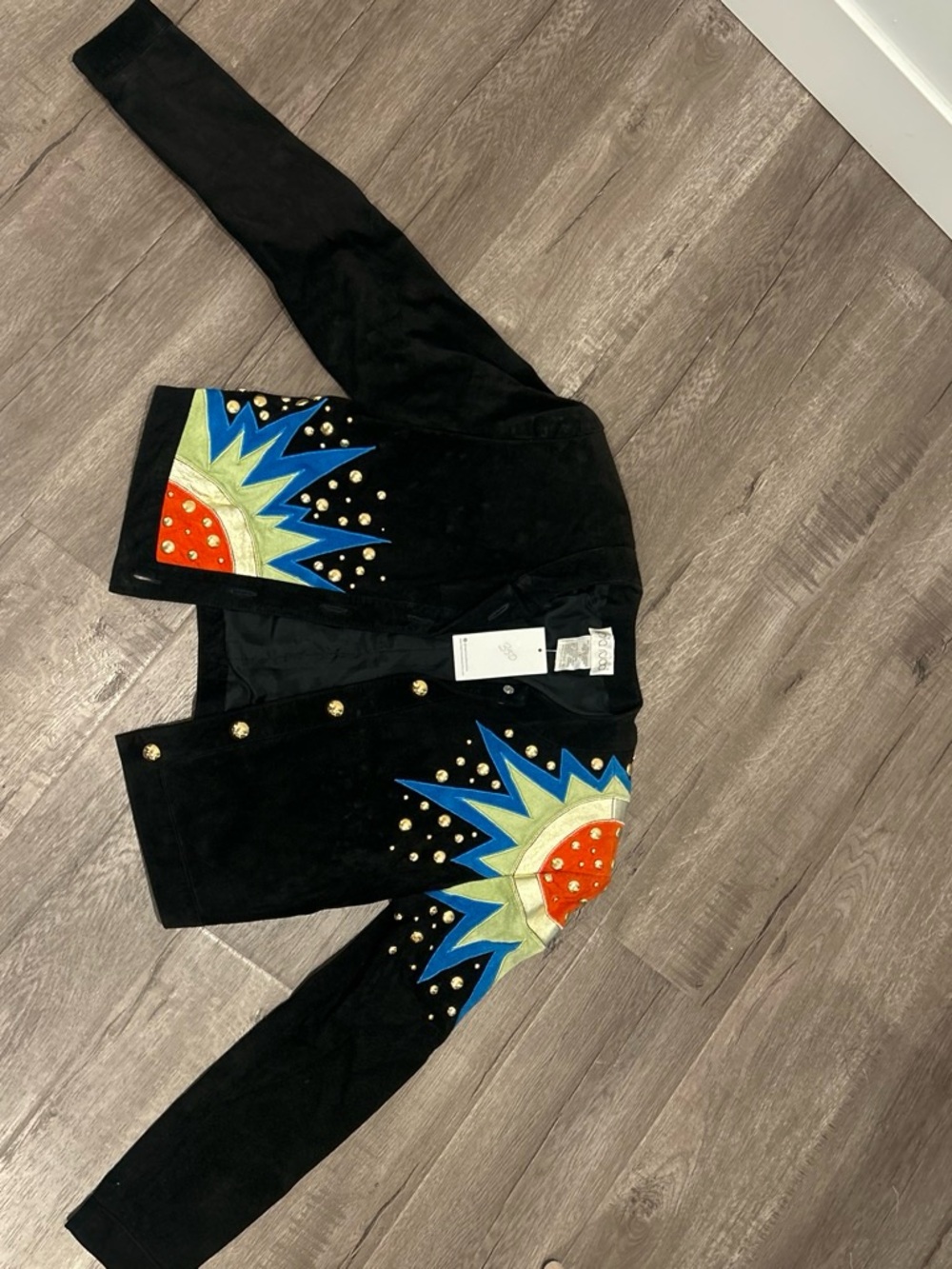 Pia Rucci Embellished Black Leather Jacket with Colorful Sunburst Design